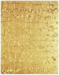 an abstract painting with gold paint on it