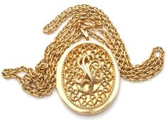 Vintage Jewelry - This is a 32" long link necklace with an oval gold tone locket pendant. The locket is 2.38" long (includes bale) by 1.5" wide. Locket opens and closes properly. Elegant Gold Locket Necklace, Elegant Gold-tone Chain Necklace With Locket, Gold-tone Medallion Chain Necklace For Formal Occasions, Vintage Gold Oval Chain Necklace, Elegant Gold Oval Link Locket Necklace, Elegant Gold Locket Necklace With Oval Link, Victorian Gold Locket Necklace, Victorian Gold Metal Locket Necklace, Victorian Style Gold Metal Locket Necklace