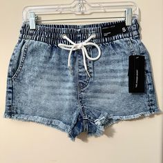 Nwt S Tie Front Frayed Edges Jogger Shorts Kendall + Kylie Any Reasonable Offers Are Welcomed!:) Type: Jogger Shorts Condition: Excellent Brand: Kendall + Kylie Flaws: None Spring Jean Shorts With Drawstring, Spring Drawstring Jean Shorts, Stretch Denim Shorts With Elastic Waistband, Trendy Drawstring Shorts, High Rise Jean Shorts With Elastic Waistband For Summer, Summer Mid-rise Shorts With Elastic Waistband, Trendy Blue Drawstring Bottoms, Blue Jean Shorts With Elastic Waistband For Summer, Blue Elastic Waistband Jean Shorts For Summer