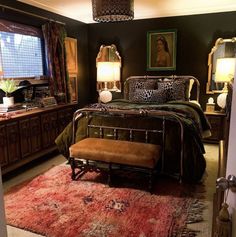 the bedroom is decorated in black and gold