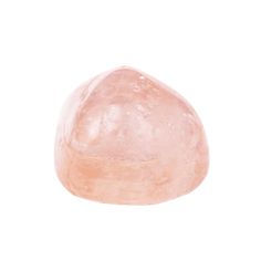 a large pink rock sitting on top of a white surface