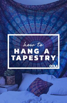 the words how to hang a tapestry in front of a bed with pillows and blankets