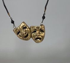 This is a classically-styled solid bronze Tragedy and Comedy Mask pendant, perfect for your next theatre trip! It's a very striking piece! Adjustable Bronze Hand Cast Necklace, Comedy Mask, Dark Naturalism, Theatre Masks, Rose Jewelry, Zipper Bags, Jewelry Bags, Natural Oils, Dream Life