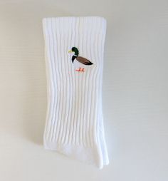 "Show off your fun and quirky style with these embroidered novelty Duck Socks! Comfortable for all day wear and has plenty of stretch. Made with Gildan cotton crew socks. Men's shoe size 6-12 Women's shoe size 8-14 Currently only available in white, but I'm hoping to expand to more colors soon! Match these socks with my bestselling \"What the Duck\" sweatshirt found here: https://www.etsy.com/DisorientedDesignCo/listing/1215168380" White Cotton Socks For Gifts, White Cotton Socks As A Gift, White Cotton Socks As Gift, Novelty Cotton Socks For Winter, Novelty Cotton Winter Socks, White Novelty Socks For Winter, Novelty White Socks For Winter, Winter Novelty Cotton Socks, Duck Socks