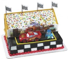 a birthday cake with cars on it