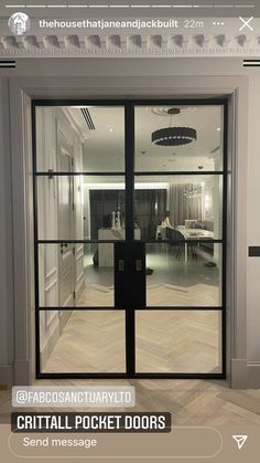 an open glass door with the words crittall pocket doors on it