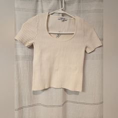 New With Tags From Madewell. Cream Color Sweater Crop Tee Xs But Fits Like Xxs. Texture Is A Bit Stiff And Fits Snug. Chic Ribbed Cotton Top, Fitted Ribbed Short Sleeve Top, Fitted Short Sleeve Top With Ribbed Neckline For Summer, Casual Ribbed Short Sleeve Fitted Top, Spring Fitted Top With Ribbed Neckline, Spring Crew Neck Top With Ribbed Detail, White Cropped Top With Ribbed Neckline, Spring Ribbed Crew Neck Top, Trendy Fitted Crew Neck Knit Top