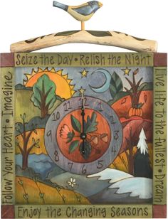 a wooden clock with an image of a bird on it's face and the words, enjoy the changing seasons