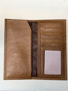 This leather wallet features multiple money and card slots. Design is embossed in the leather. Wedge Mules, Outerwear Vest, Denim Accessories, Boy Tees, Plus Size Shopping, Mallard, Gift Accessories, Accessories Rings, Gifts For Boys