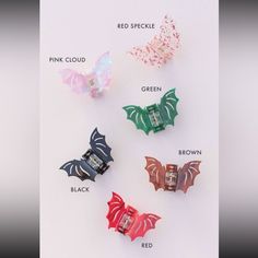 four different colored and shaped hair clips on a white surface with words describing the names of them