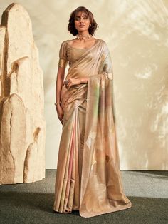 The saree features intricate thread embroidery and zari work, giving it a stunning and elegant look. Made from high-quality silk material, this saree drapes beautifully and comfortably, making it perfect for any special occasion.
The matching color silk blouse with zari weaving work complements the saree perfectly, creating a cohesive and stylish ensemble. The 5.50-meter saree and unstitched blouse material allow for customization to ensure the perfect fit for any body type. Pair this gorgeous s Beige Saree, Lehenga Crop Top, Lehenga Choli Wedding, Reception Gown, Bollywood Lehenga, Cotton Silk Saree, Beige Silk, Traditional Saree, Half Sleeve Blouse