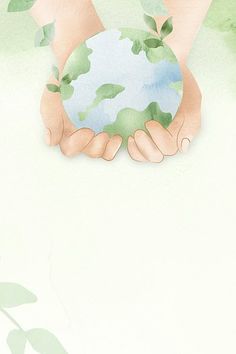 two hands holding a green globe with leaves on it