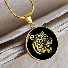 "This Tiger Necklace Is the Perfect Gift Whether for Yourself or a Loved One.  Explore all our Inspirational jewelry here: https://www.etsy.com/in-en/shop/SymbolicPresent?ref=seller-platform-mcnav&section_id=31033166 ➜ Our jewelry is made of high-quality surgical steel with a shatterproof liquid glass coating and an 18k gold finish option. ➜ Engrave onto the back of the Tiger pendant your loved one's name, your wedding date, an anniversary, or anything else you want to remember and keep you clos Symbolic Chain Jewelry As Gift, Pendant Chain Jewelry Gift, Spiritual Jewelry With Box Chain And Round Pendant, Spiritual Box Chain Jewelry With Round Pendant, Spiritual Jewelry With Round Pendant Box Chain, Stainless Steel Box Chain Jewelry, Stainless Steel Round Pendant For Jewelry Making, Personalized Snake Chain Jewelry As Gift, Symbolic Round Pendant Chain Jewelry