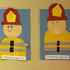 two fireman paper cut outs on a wall