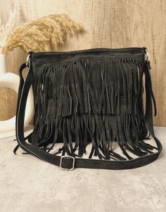 Soft Real Suede Leather Black Fringe Tassel Crossbody Bag/ Suede Leather Black Shoulder bag Fringe bags/ Black Suede Bags Gifts for her Zipper closure on top  2 fringed layers design  Back zipped pocket  Internal zipped pocket  Silver tone metal hardware  Fully lined inside  Soft Real Suede Leather  Handle drop: 60cm  Dimensions: H30cm x W32cm x D4cm Black Tassel Crossbody Bag, Black Travel Shoulder Bag With Tassels, Black Bags With Tassels For Everyday Use, Black Tassel Bag For Everyday Use, Black Hobo Bag With Tassels For Everyday Use, Black Rectangular Bag With Fringe, Black Tasseled Hobo Bag, Black Fringe Shoulder Bag For Travel, Black Shoulder Bag With Tassels For Everyday Use