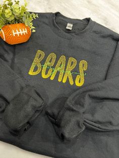 Support your Baylor Bears in a custom embroidered sweatshirt. You'll be ready to cheer on your favorite players in a soft and warm fashion. The sweatshirt pictured is a black gildan sweatshirt.  Each item is prewashed. Please choose the color sweatshirt you wish to purchase: black or charcoal gray **Please contact me for any special requests** Black Long Sleeve Sweatshirt For Game Day, Black Team Spirit Sweatshirt With Ribbed Cuffs, Sports Season Embroidered Sweatshirt For Streetwear, Embroidered Graphics Sweatshirt For Sports Season Streetwear, Black Fleece Fan Apparel Sweatshirt, Black Fleece Sweatshirt Fan Apparel, Black Fleece Sweatshirt For Fans, Team Spirit Black Sweatshirt For Streetwear, Black Team Spirit Sweatshirt For Streetwear