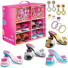 barbie's shoes and accessories are shown in this toy display case, with the contents displayed