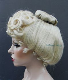 This wig is totally GORGEOUS!   This is a professional quality Gibson Girl wig .. designed for Theater productions .. or you can wear it for a fancy dress*-up event. This is brand new with tags and includes care instructions.  Fits average heads .. 21.5 to 22.5"  This feels very much like real hair but is actually synthetic wig fiber. This listing is for the pale blonde with but I  have more colors available here in my Etsy shop. Please be sure to order carefully since SALE ARE FINAL FOR HEALTH Victorian Wig, George Washington Wig, Wigs 1960's, Vintage Blonde Wig, Rococo Wig Woman, Short Blue Hair, Pale Blonde, Fancy Dress Up, Champagne Blonde