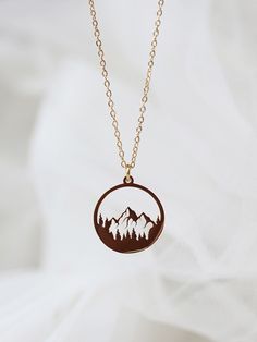 14K gold thick layered over High Quality Solid Stainless Steel. can be worn in water.  Our jewelry is made to last, anti-tarnish, higher durability than a regular gold-plated brass material, perfect for everyday wear. * Finish: 14K Gold * Natural/Mountain view forest princess necklace * Featuring Adjustable Chain 16.5 inches to 18.5 inches. * All items are nicely packaged ready to gift in elegant jewelry boxes We meet your demands with expert craftsmanship. Our biggest goal is to serve you in top quality. Mostly our products are open for personalization, feel free to ask for any kind of customization for the product you are interested in. We will gladly try to make it happen. Nature-inspired Personalized Jewelry For Everyday, Nature-inspired Personalized Everyday Jewelry, Bohemian Circle Jewelry For Gifts, Nature-inspired Adjustable Hypoallergenic Jewelry, Unique Rose Gold Round Pendant Jewelry, Nature-inspired Round Pendant Jewelry Gift, Adjustable Round Nature-inspired Necklace, Nature-inspired Round Necklace For Gift, Nature-inspired Round Necklace For Gifts