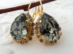 "Smokey Gray black diamond crystal European teardrop earrings, Drop earrings, Dangle earrings, Gold earrings,Bridal earrings, Bridesmaids Elegant and refined. These earrings are so elegant and blasting with color. They would be great as bridal earrings or for any available other day. Perfect gift for bridesmaids or other occasions. They are made of 14k gold plated brass posts and Swarovski crystals, all set in prong setting. Made with CRYSTALLIZED™ - high quality genuine European (Austrian) crys Gold Earrings Bridal, Blue Opal Earrings, Oxidized Silver Earrings, Crystal Teardrop Earrings, Black Diamond Earrings, Dangle Earrings Gold, Gray Earrings, Gold Bridal Earrings, Earrings Teardrop