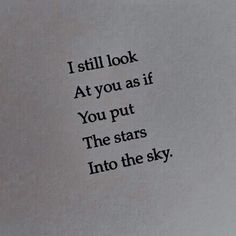 an old book with the words i still look at you as if you put the stars into the sky