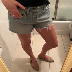 Rare Find!! Vintage Button Fly Levi's 501 Cutoff Jean Shorts! Such A Classic Closet Staple! These Deserve To Become Someone's Everyday Shorts! I'm A Size S (4/6) And That's Me Modeling Them; Also See Measurements Below. Fabric Content: * 100% Cotton Approximate Measurements (Laying Flat, Unstretched): * Waist: 14.5" * Length: 10.25" In Front; 12" In Back; 3" Inseam Condition: * Excellent, Gently Used Condition As Shown! Check Out The Rest Of My Closet And Bundle To Save! All Items Are Carefully Levi’s Shorts 501, Levi's Mid-rise Denim Blue Shorts, Levi's Cutoff Denim Blue Shorts, Levi's Blue Cutoff Shorts, Classic Closet, Cutoff Jean Shorts, Levi's Short Bottoms With Built-in Shorts, Vintage Levis 501, Levi Shorts