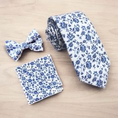 Our blue floral necktie are the PERFECT choice for dusty blue wedding, mens floral ties for groomsmen or any other special occasion! //SHIPPING// We ship via USPS. **FIRST CLASS MAIL (default) takes 2-5 business days to arrive AFTER your package is shipped.  **PRIORITY MAIL takes 1-3 business days to arrive AFTER the items are shipped.  //Important// Business Days are Monday-Friday //International Orders// Please understand that International Orders take 4-6 weeks and customs need to be factored Mens Floral Ties, Blue Floral Bow Tie, Mens Floral Tie, Blue Floral Tie, Floral Ties, Wedding Extras, Gold Bow Tie, Yellow Bow Tie, Purple Bow Tie