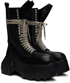 Mid-calf vegetable-tanned and waxed calfskin boots in black. · Lace-up closure · Extended tongue · Pull-loop at heel collar · Zip closure at inner side · Buffed calfskin lining · Logo embossed at padded calfskin footbed · Lugged EVA foam rubber platform sole · Platform: H3.5 Supplier color: Black/Black Leather High-top Mid-calf Boots With Rubber Sole, High-top Combat Boots With Calf Leather And Leather Sole, High-top Combat Boots In Calf Leather With Leather Sole, High-top Combat Boots With Vibram Sole In Calf Leather, High-top Combat Boots With Leather Sole, High Ankle Calf Leather Moto Boots With Rubber Sole, Black Combat Boots With Rubber Sole In Calf Leather, Black Calf Leather Combat Boots With Reinforced Heel, Black Combat Boots With Reinforced Heel In Calf Leather