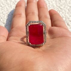 Ruby Diamond Ring features doublet stone surrounded by CZ diamonds. Perfect for any special occasions. These Statement Cocktail Ring will surely elevate your whole look. Perfect for bride gift or gift for mom. *𝐏𝐑𝐎𝐃𝐔𝐂𝐓 𝐃𝐄𝐓𝐀𝐈𝐋* * 𝐌𝐚𝐭𝐞𝐫𝐢𝐚𝐥: Brass * 𝐏𝐥𝐚𝐭𝐢𝐧𝐠: White Rhodium Plated * 𝐒𝐭𝐨𝐧𝐞: AAA-quality CZ Diamond & Ruby. 𝐕𝐢𝐬𝐢𝐭 𝐎𝐮𝐫 𝐅𝐀𝐐𝐬 𝐟𝐨𝐫 𝐒𝐡𝐢𝐩𝐩𝐢𝐧𝐠 𝐏𝐨𝐥𝐢𝐜𝐢𝐞𝐬 𝐚𝐧𝐝 𝐂𝐚𝐫𝐞 𝐈𝐧𝐬𝐭𝐫𝐮𝐜𝐭𝐢𝐨𝐧 *𝐃𝐈𝐒𝐂𝐋𝐀𝐈𝐌𝐄𝐑* * Product color may slightly vary due to photographic lighting sources or your screen settings. * Stone color may vary slightly due to variations in natural stones. *𝐒𝐈𝐌𝐈𝐋𝐀𝐑 𝐃𝐄𝐒𝐈𝐆𝐍* https://www.etsy.com/listing/1756908147/ Elegant Ruby Ring With Diamond Settings, Dazzling Ruby Ring With Vvs Clarity, Dazzling Red Ring With Accent Stones, Dazzling Ruby Ring With Diamond Accents, Red Crystal Ring With Prong Setting, Red Diamond Ring With Accents, Red Dazzling Promise Ring, Dazzling Red Diamond Ring With Accents, Dazzling Red Diamond Ring With Diamond Accents