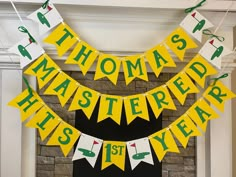 there is a yellow and green banner hanging from the fireplace mantel with letters that spell it's st patrick's day