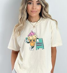 Ice cream shirt, Sunday Fun Day Shirt, Ice Cream Gift, Ice Cream Gifts, Ice Cream kids shirt, 60s Fashion, 60s t shirt, retro 60s shirt, cartoon character, retro graphic tshirts, retro shirt women, retro shirt men, retro graphic, aesthetic shirt, Vintage Graphic tee, character tee, teen food shirt, Funny food shirt,  Sundae Fun Day is a classic Retro Comfort Colors tshirt. It's for ice cream lovers big and small, and is fashionable for all different types of outfits.  This durable t-shirt feels Retro Short Sleeve T-shirt With Graphic Print, Trendy Short Sleeve Shirt With Character Print, Retro Summer Tops With Cartoon Print, Retro Cartoon Print Summer Tops, Fun Short Sleeve Tops With Cartoon Print, Funny Short Sleeve Shirt With Character Print, Trendy Crew Neck Shirt With Character Print, Trendy Relaxed Fit Shirt With Character Print, Graphic Tee With Cartoon Print And Short Sleeves