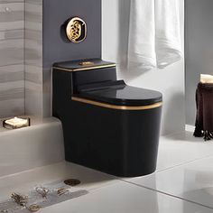 a black toilet sitting next to a bath tub in a bathroom with white walls and flooring