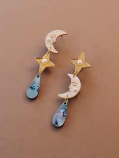 Asymmetric statement clip-on earrings with moon, star and teardrop motifs. Handmade in our North London studio. Moon Phase Earrings, Mother Of Pearl Meaning, Witchy Earrings, Playful Jewelry, Celestial Earrings, Pearl Details, Wolf Moon, Moon Jewelry, Moon Star