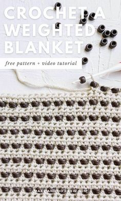 the crochet weighted blanket pattern is shown with yarn and scissors on top of it