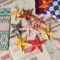 some paper stars are laying on the table