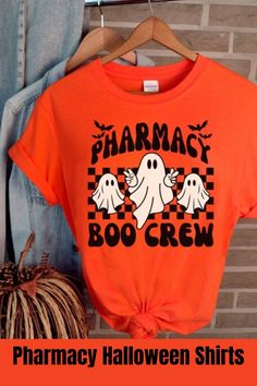 an orange shirt that says pharmacy boo crew on it and two ghostes in the background