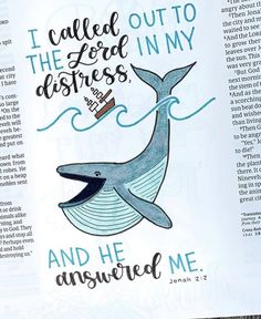 an open bible with a drawing of a whale and the words i called out to the lord in my distresss