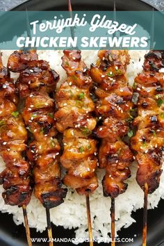 chicken satay on skewers with rice and sauce