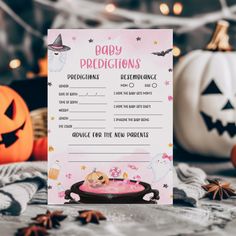 a halloween baby shower game with pumpkins and jack - o'- lanterns in the background