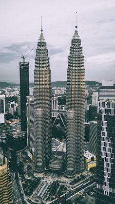 an aerial view of some very tall buildings