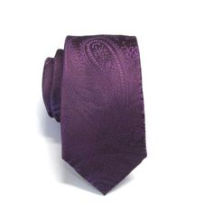 This trendy skinny tie is made of a 100% silk, all new material.It measures 58" long and 2" at the widest point. Elegant Paisley Print Neckwear For Business, Elegant Semi-formal Neckwear With Paisley Print, Fitted Purple Suit And Tie Accessories For Party, Semi-formal Fitted Purple Suit And Tie Accessories, Elegant Black Tie Suit Accessories With Paisley Print, Formal Purple Standard Tie, Formal Purple Neckwear With Ties, Elegant Semi-formal Ties With Paisley Print, Elegant Semi-formal Paisley Print Ties