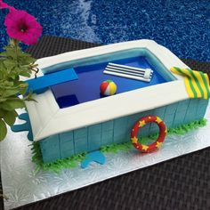 a cake shaped like an inflatable swimming pool