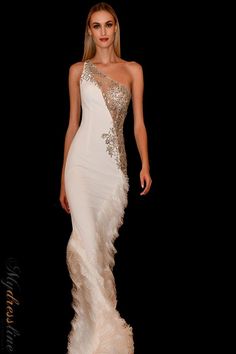 Looking for a sexy prom dress that will turn heads? Check out Jovani style 03389. This one shoulder dress is perfect for making a statement at your next formal event. Whether you're headed to prom or a black tie gala, this dress is sure to make you stand out from the crowd. With intricate beadwork and a figure-flattering silhouette, this Jovani gown is sure to turn heads wherever you go. Form Fitting Prom Dresses, Prom Dress Couture, Mnm Couture, Prom Dresses Jovani, Embellished Skirt, Exquisite Gowns, Trumpet Gown, One Shoulder Gown, Asymmetric Neckline