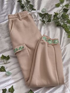 🎕 ↬ABOUT THE DESIGN↫ 🎕 This cottagecore inspired sweatpants is made from 95% organic cotton and 5% recycled polyester. I make everything from samples to designs and tech packs. Which I then get help from a clothing manufacturer to help me make limited amounts of these clothes. My goal is so design clothes and donate part of the profits I make to different organizations! A portion of the profits made from this product will go towards helping World Wildlife Fund. Please view the sizing chart as Cotton Cargo Pocket Joggers For Loungewear, Beige Cotton Joggers With Elastic Waistband, Spring Cotton Joggers With Pockets, Beige Sweatpants With Pockets For Spring, Beige Cotton Sweatpants With Pockets, Beige Cotton Loungewear Cargo Pants, Beige Cotton Cargo Pants For Loungewear, Cotton Sweatpants With Cargo Pockets For Loungewear, Trendy Cotton Cargo Pants For Loungewear