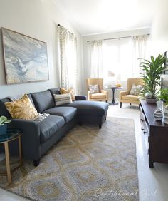 the living room is clean and ready for guests to use it as an office space