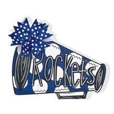 a blue and white sticker with the word rockies on it's side, next to a polka dot bow