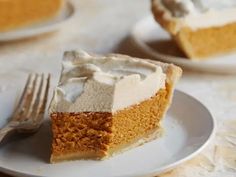 a slice of pumpkin pie on a plate with a fork