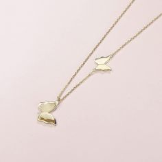 A twinkling butterfly with flying wings creates a romantic botanical theme. The shimmering finish makes this rosy butterfly unique and sparkling. Material: 14K Yellow Gold Dimension: 15 mm x 20 mm Chain Length: 16"+2" Chain: Cable Weight: 2.46 grams Origin: Imported Elegant Rose Gold Butterfly Necklace With Adjustable Chain, Elegant 14k Gold Butterfly Necklace, Yellow Gold Butterfly Necklace With Adjustable Chain, Elegant Rose Gold Butterfly Necklace As Gift, Elegant Rose Gold Butterfly Necklace For Gift, Elegant Rose Gold Butterfly Necklace Gift, Delicate Rose Gold Butterfly Charm Necklace, Dainty Formal Butterfly Charm Necklace, Delicate Butterfly Necklace For Formal Occasions