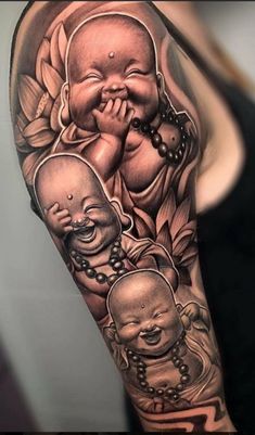 a woman with a tattoo on her arm that has pictures of buddhas and babies