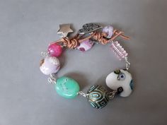 Wire wrapped eclectic mix of Chrysoprase nugget,  Millefiori Heart, vintage pink, Cherry Quartz and Pewter heart/bee button Pink Heart-shaped Bohemian Bracelets, Pink Bohemian Heart-shaped Bracelets, Heart Vintage, Turtle Bracelet, Cherry Quartz, Hippie Bracelets, Owl Necklace, Pink Cherry, Boho Bracelet